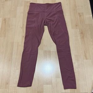 Athleta pink leggings with pockets on both sides